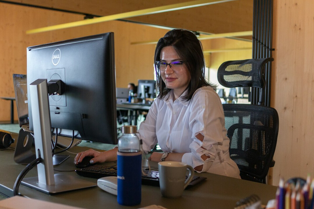 professional coder at desk