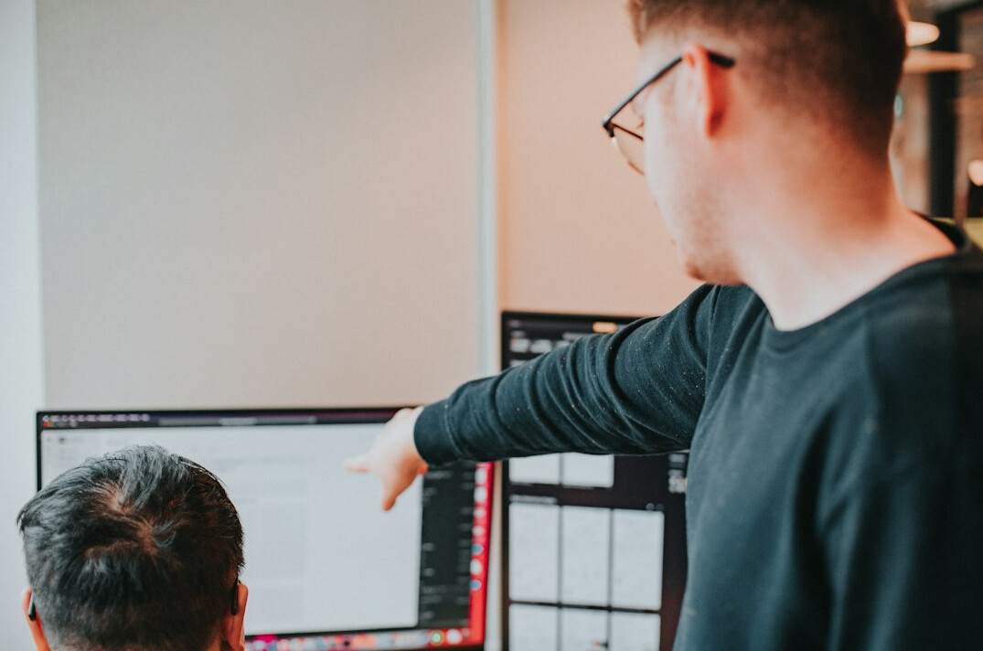 instructor helping student with code
